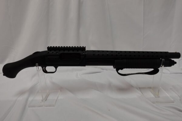 Mossberg 590 Shockwave SPX 12 Ga  12/14.3" Picatanny Rail/Heat Shield; 2 grips. 50648
