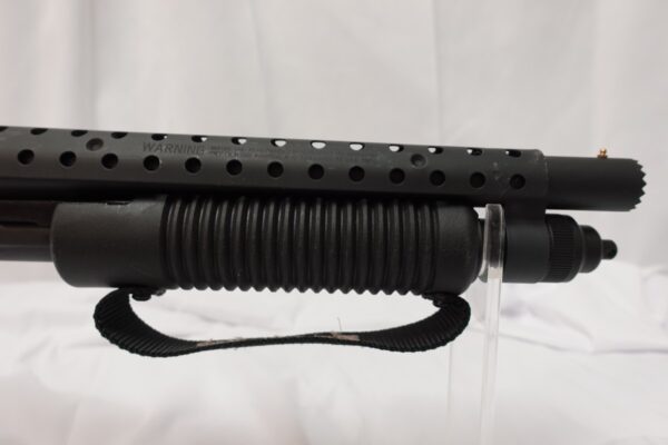 Mossberg 590 Shockwave SPX 12 Ga  12/14.3" Picatanny Rail/Heat Shield; 2 grips. 50648